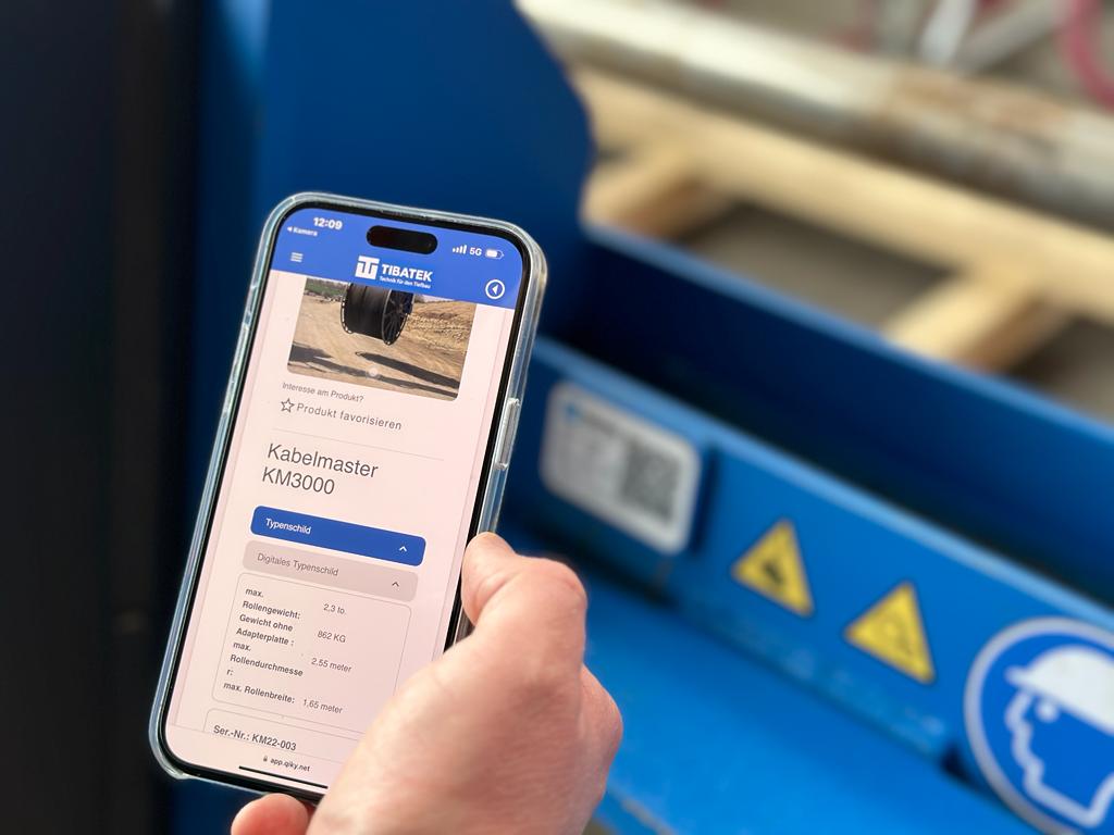 Zicht op een mobiele telefoon met de QIKY-toepassing in actie.